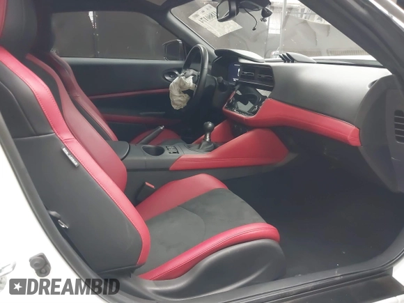 2024 Nissan Z Performance with VIN JN1BZ4BH9RM364239, listed as a IAAI auction lot 41860174 with 7,501 mi miles and . Bid and sale history available at DreamBid. Image 5.