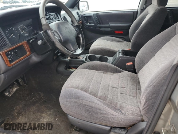 1998 Jeep Grand Cherokee Laredo with VIN 1J4GZ58S6WC137968, listed as a Copart auction lot 84083454 with 0 mi miles and Non Repairable. Bid and sale history available at carsss.com. Image 7.