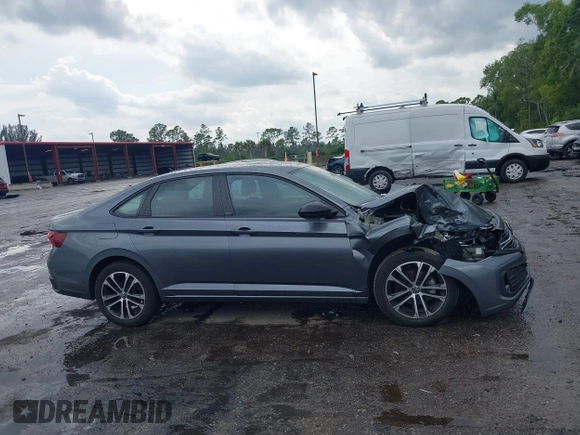 2023 Volkswagen Jetta Sport with VIN 3VWBM7BU8PM005151, listed as a IAAI auction lot 41886412 with 23,351 mi miles and . Bid and sale history available at DreamBid. Image 13.