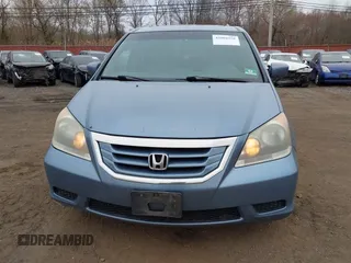 2010 Honda Odyssey EX-L with VIN 5FNRL3H79AB088793, listed as a IAAI auction lot 42008558 with 282,980 mi miles. Bid and sale history available at carsss.com. Image 12.