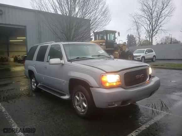 2000 GMC Denali with VIN 1GKEK13R9YR104210, listed as a Copart auction lot 85599964 with 1,548,394 mi miles and Salvage Title. Bid and sale history available at carsss.com. Image 12.