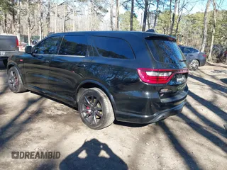 2018 Dodge Durango SRT with VIN 1C4SDJGJ6JC416538, listed as a IAAI auction lot 41440038 with 67,650 mi miles and . Bid and sale history available at DreamBid. Image 3.