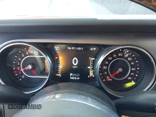 2021 Jeep Gladiator Mojave with VIN 1C6JJTEG9ML528964, listed as a IAAI auction lot 41879113 with 74,315 mi miles and . Bid and sale history available at DreamBid. Image 7.