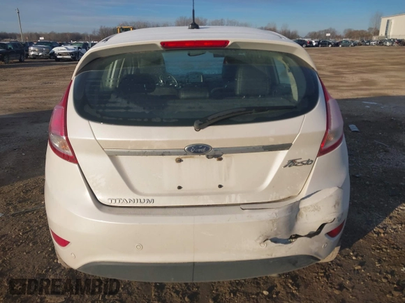 2017 Ford Fiesta Titanium with VIN 3FADP4FJ8HM112435, listed as a IAAI auction lot 41005143 with 75,144 mi miles and . Bid and sale history available at DreamBid. Image 16.