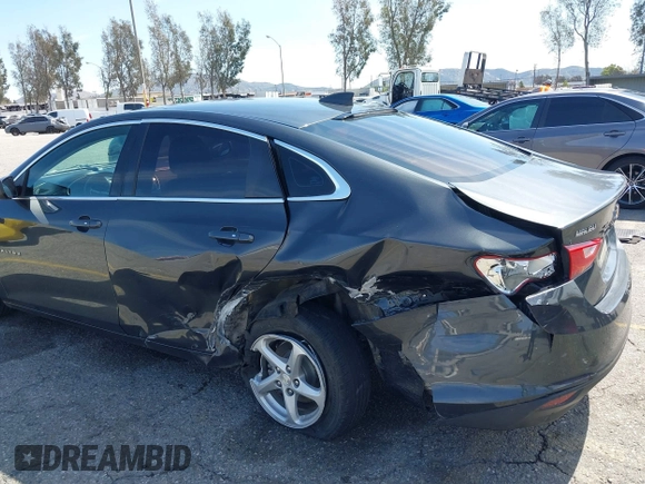 2018 Chevrolet Malibu LS with VIN 1G1ZB5ST2JF231804, listed as a IAAI auction lot 41756421 with 128,447 mi miles and . Bid and sale history available at DreamBid. Image 6.