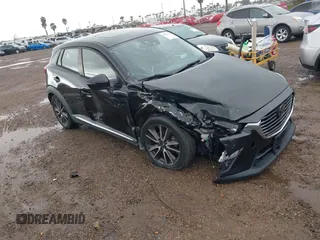2016 Mazda CX-3 Grand Touring with VIN JM1DKBD7XG0125001, listed as a IAAI auction lot 41777712 with 42,453 mi miles. Bid and sale history available at carsss.com. Image 1.