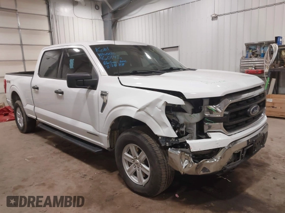 2023 Ford F-150 XL with VIN 1FTFW1ED6PFC14587, listed as a IAAI auction lot 41827273 with 87,267 mi miles. Bid and sale history available at carsss.com. Image 1.