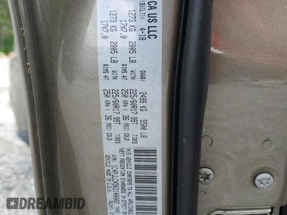 2019 Jeep Cherokee Latitude z VIN 1C4PJLCX5KD148002, wystawiony jako Copart lot #54170595 z przebiegiem 136 852 mil mil oraz Szkoda całkowita • Salvage title. Historia ofert i sprzedaży dostępna na DreamBid. Obrazek 13.