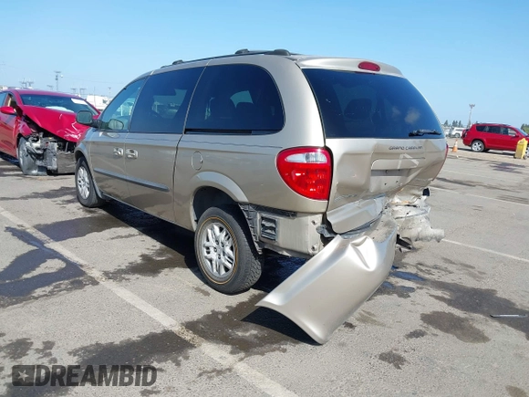 2003 Dodge Caravan Sport with VIN 2D4GP44R73R279132, listed as a IAAI auction lot 42100140 with 218,201 mi miles and . Bid and sale history available at carsss.com. Image 3.