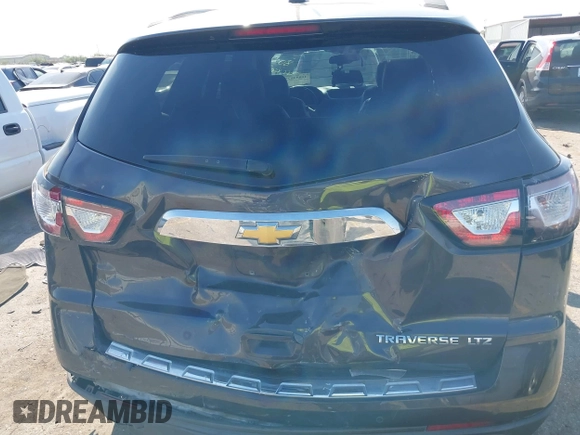 2016 Chevrolet Traverse LTZ z VIN 1GNKRJKD1GJ301277, wystawiony jako IAAI lot #41884629 z przebiegiem 106 338 mil mil oraz . Historia ofert i sprzedaży dostępna na DreamBid. Obrazek 16.