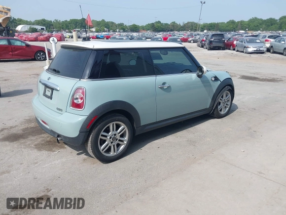 2013 MINI Hardtop with VIN WMWSU3C51DT372387, listed as a IAAI auction lot 42514124 with 100,560 mi miles and . Bid and sale history available at DreamBid. Image 4.