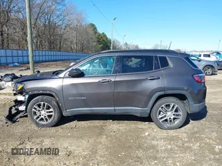 2020 Jeep Compass Latitude with VIN 3C4NJCBB4LT177001, listed as a IAAI auction lot 41210982 with 77,764 mi miles and . Bid and sale history available at DreamBid. Image 13.