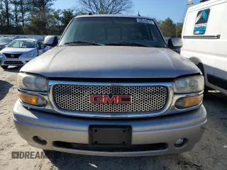 2005 GMC Sierra Denali z VIN 2GTEK63N551145668, wystawiony jako Copart lot #50544675 z przebiegiem Nie podano mil oraz Tytuł czysty. Historia ofert i sprzedaży dostępna na DreamBid. Obrazek 5.