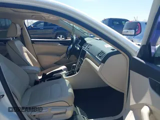 2016 Volkswagen Passat SE z VIN 1VWBS7A3XGC064217, wystawiony jako IAAI lot #41864169 z przebiegiem 136 053 mil mil oraz . Historia ofert i sprzedaży dostępna na DreamBid. Obrazek 5.