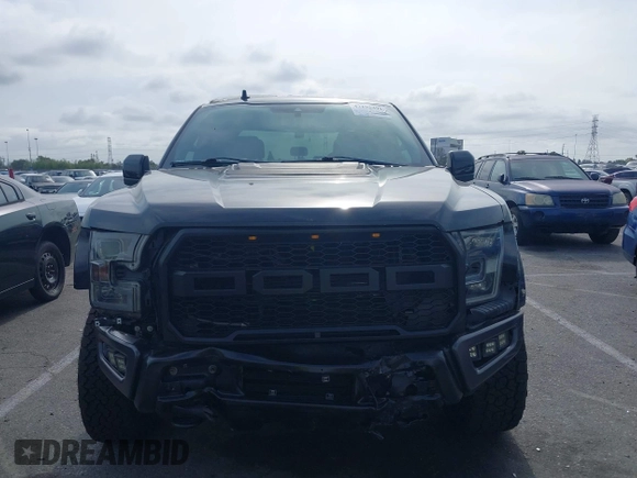2020 Ford F-150 Raptor with VIN 1FTFW1RG2LFA30858, listed as a IAAI auction lot 42192391 with 90,018 mi miles and . Bid and sale history available at carsss.com. Image 12.
