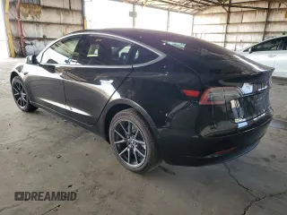 2018 Tesla Model 3 Long Range Battery with VIN 5YJ3E1EA6JF011383, listed as a Copart auction lot 51147185 with 148,507 mi miles and Clean Title. Bid and sale history available at DreamBid. Image 2.