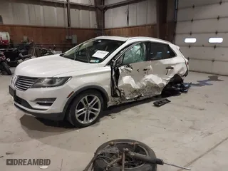 2015 Lincoln MKC with VIN 5LMTJ2AH5FUJ08604, listed as a IAAI auction lot 41350903 with 76982 miles. Bid and sale history available at carsss.com. Image 17.