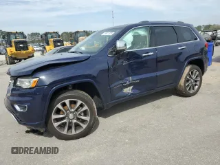 2017 Jeep Grand Cherokee Overland with VIN 1C4RJFCG6HC602413, listed as a Copart auction lot 49641325 with 157,558 mi miles and Salvage Title. Bid and sale history available at carsss.com. Image 1.