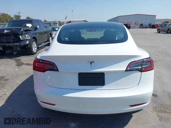 2023 Tesla Model 3 with VIN 5YJ3E1EA9PF585632, listed as a IAAI auction lot 40520993 with 7,775 mi miles and . Bid and sale history available at DreamBid. Image 17.