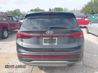 2021 Hyundai Santa Fe SE with VIN 5NMS14AJ7MH355662, listed as a IAAI auction lot 41848014 with 49,570 mi miles. Bid and sale history available at carsss.com. Image 16.