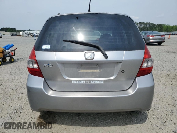 2007 Honda Fit z VIN JHMGD38427S021652, wystawiony jako Copart lot #52692775 z przebiegiem 178 416 mil mil oraz Szkoda całkowita • Salvage title. Historia ofert i sprzedaży dostępna na DreamBid. Obrazek 6.