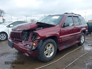 1999 Jeep Grand Cherokee Limited with VIN 1J4GW68N5XC642670, listed as a IAAI auction lot 41990199 with 154,492 mi miles. Bid and sale history available at carsss.com. Image 18.