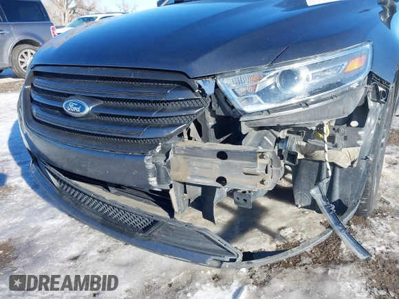 2015 Ford Taurus Limited with VIN 1FAHP2J85FG165823, listed as a IAAI auction lot 41315889 with 134,165 mi miles. Bid and sale history available at carsss.com. Image 6.