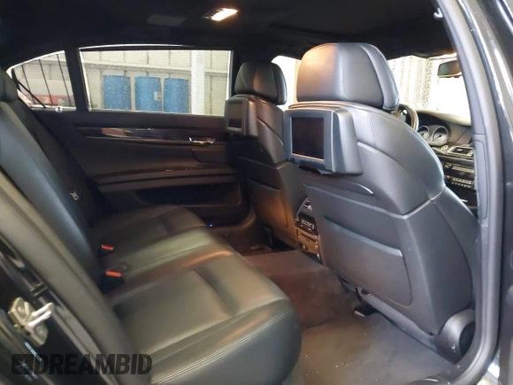 2011 BMW 7 Series 750Li xDrive with VIN WBAKC8C58BC432517, listed as a IAAI auction lot 41874352 with 125,288 mi miles and . Bid and sale history available at DreamBid. Image 8.