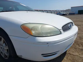 2007 Ford Taurus SE with VIN 1FAFP53U57A193385, listed as a IAAI auction lot 42410658 with 263,987 mi miles and . Bid and sale history available at DreamBid. Image 13.