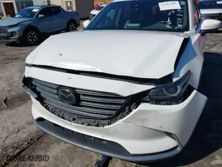 2020 Mazda CX-9 Grand Touring with VIN JM3TCADY5L0413201, listed as a IAAI auction lot 41462802 with 164,625 mi miles. Bid and sale history available at carsss.com. Image 6.