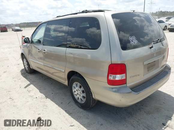 2005 Kia Sedona LX with VIN KNDUP131756627998, listed as a IAAI auction lot 42058213 with 152,433 mi miles. Bid and sale history available at carsss.com. Image 3.
