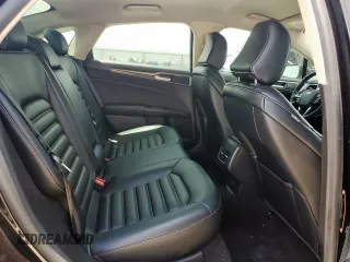 2020 Ford Fusion SEL z VIN 3FA6P0CD5LR168103, wystawiony jako Copart lot #62559935 z przebiegiem 60 240 mil mil oraz Szkoda całkowita • Salvage title. Historia ofert i sprzedaży dostępna na DreamBid. Obrazek 10.
