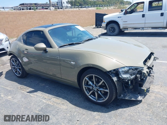 2023 Mazda MX-5 Miata Grand Touring z VIN JM1NDAM73P0561844, wystawiony jako IAAI lot #42195198 z przebiegiem 6 020 mil mil oraz . Historia ofert i sprzedaży dostępna na DreamBid. Obrazek 1.