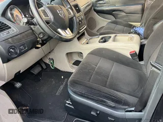 2013 Dodge Grand Caravan SXT with VIN 2C4RDGCG1DR616704, listed as a IAAI auction lot 42128513 with 112,210 mi miles and . Bid and sale history available at DreamBid. Image 1.