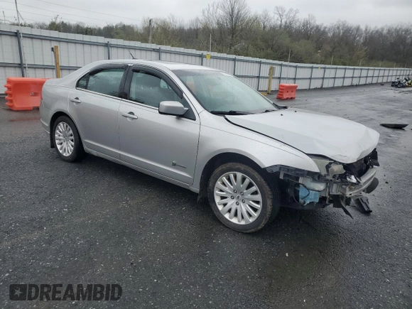 2010 Ford Fusion Hybrid z VIN 3FADP0L30AR122805, wystawiony jako Copart lot #52276255 z przebiegiem 146 073 mil mil oraz Szkoda całkowita • Salvage title. Historia ofert i sprzedaży dostępna na DreamBid. Obrazek 4.