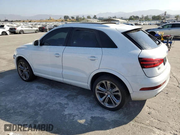 2015 Audi Q3 Prestige with VIN WA1FFCFS5FR008970, listed as a Copart auction lot 63481644 with 103,795 mi miles and Salvage title. Bid and sale history available at DreamBid. Image 2.