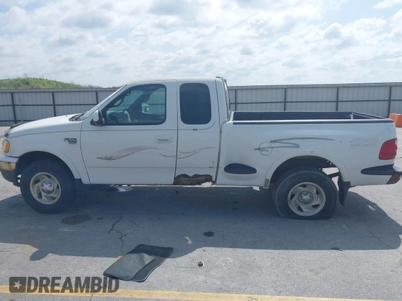2000 Ford F-150 z VIN 2FTRX08W3YCA83858, wystawiony jako IAAI lot #42569957 z przebiegiem Nie podano mil oraz . Historia ofert i sprzedaży dostępna na DreamBid. Obrazek 14.