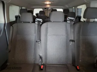2015 Ford Transit Wagon XL with VIN 1FBZX2YM6FKA50943, listed as a Copart auction lot 72040064 with 199,102 mi miles and Salvage Title. Bid and sale history available at carsss.com. Image 10.