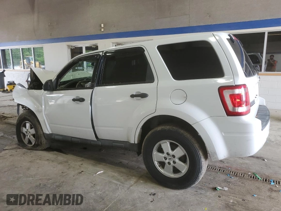 2010 Ford Escape XLS with VIN 1FMCU9C75AKD02318, listed as a Copart auction lot 59130055 with Not provided miles and Salvage title. Bid and sale history available at DreamBid. Image 2.