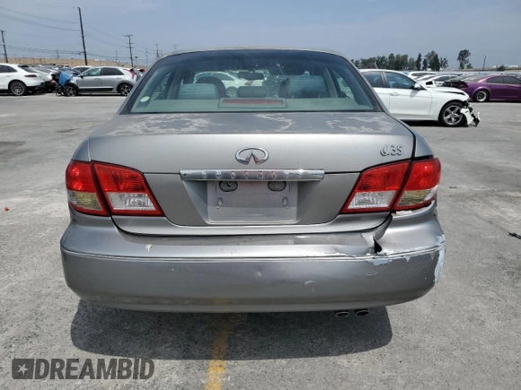 2003 Infiniti I35 Luxury z VIN JNKDA31A43T113863, wystawiony jako Copart lot #58551715 z przebiegiem 78 871 mil mil oraz Szkoda całkowita • Salvage title. Historia ofert i sprzedaży dostępna na DreamBid. Obrazek 6.