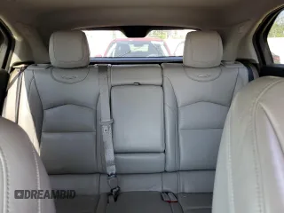 2019 Cadillac XT4 FWD Premium Luxury z VIN 1GYFZCR4XKF224734, wystawiony jako Copart lot #54141975 z przebiegiem 87 633 mil mil oraz Szkody całkowita. Historia ofert i sprzedaży dostępna na DreamBid. Obrazek 10.