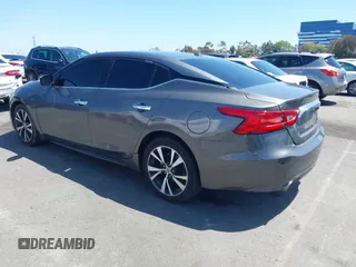 2018 Nissan Maxima Platinum z VIN 1N4AA6AP1JC388815, wystawiony jako IAAI lot #42098902 z przebiegiem 80 677 mil mil oraz . Historia ofert i sprzedaży dostępna na DreamBid. Obrazek 3.