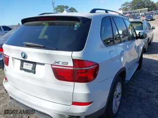 2011 BMW X5 35i with VIN 5UXZV4C58BL402047, listed as a IAAI auction lot 41837120 with 168,325 mi miles. Bid and sale history available at carsss.com. Image 4.