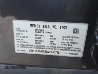 2021 Tesla Model S Plaid with VIN 5YJSA1E60MF455768, listed as a IAAI auction lot 41603504 with 27,398 mi miles. Bid and sale history available at carsss.com. Image 9.