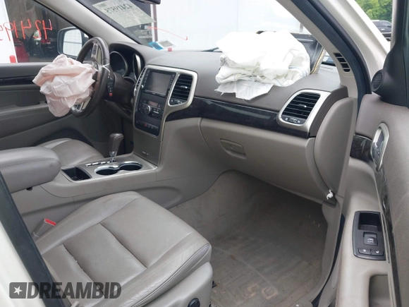2011 Jeep Grand Cherokee Laredo with VIN 1J4RR4GG6BC680943, listed as a IAAI auction lot 42419575 with 188,672 mi miles and . Bid and sale history available at DreamBid. Image 5.
