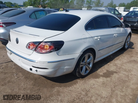 2012 Volkswagen CC Sport with VIN WVWMP7AN7CE504553, listed as a IAAI auction lot 42469902 with 141,634 mi miles and . Bid and sale history available at DreamBid. Image 4.