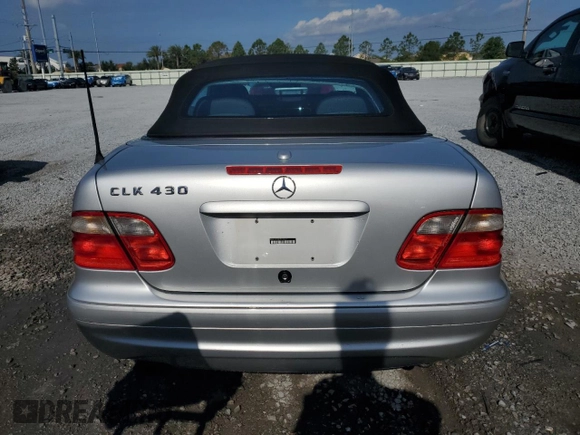 2000 Mercedes-Benz CLK 320/430 z VIN WDBLK70G4YT035047, wystawiony jako Copart lot #52852405 z przebiegiem 141 197 mil mil oraz Szkoda całkowita • Salvage title. Historia ofert i sprzedaży dostępna na DreamBid. Obrazek 6.