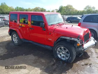 2014 Jeep Wrangler Unlimited Sahara z VIN 1C4BJWEG6EL128814, wystawiony jako IAAI lot #42213351 z przebiegiem 110 589 mil mil oraz . Historia ofert i sprzedaży dostępna na DreamBid. Obrazek 1.