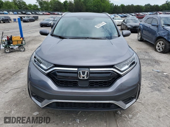 2020 Honda CR-V Touring z VIN 7FARW1H97LE009965, wystawiony jako Copart lot #55317275 z przebiegiem 47 369 mil mil oraz Szkoda całkowita • Salvage title. Historia ofert i sprzedaży dostępna na DreamBid. Obrazek 5.