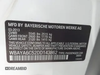 2013 BMW 7 Series 740i with VIN WBAYA6C52DD143862, listed as a IAAI auction lot 41859183 with 133,666 mi miles. Bid and sale history available at carsss.com. Image 9.